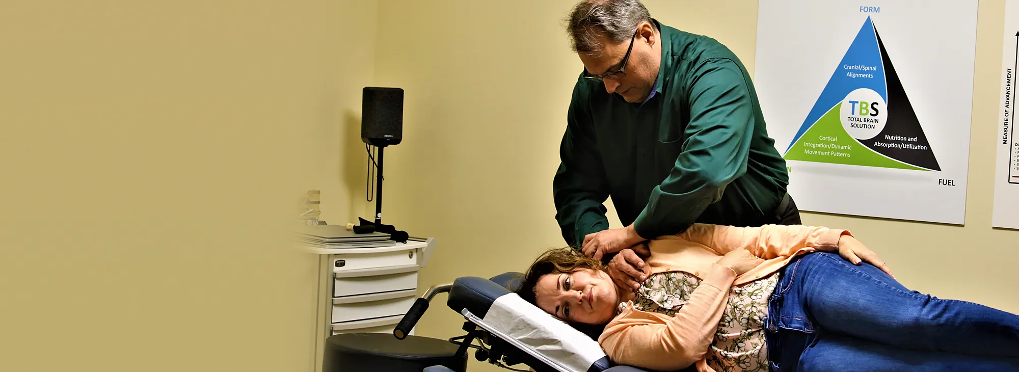 Dr. Andy Marrone performing a gentle adjustment on a patient