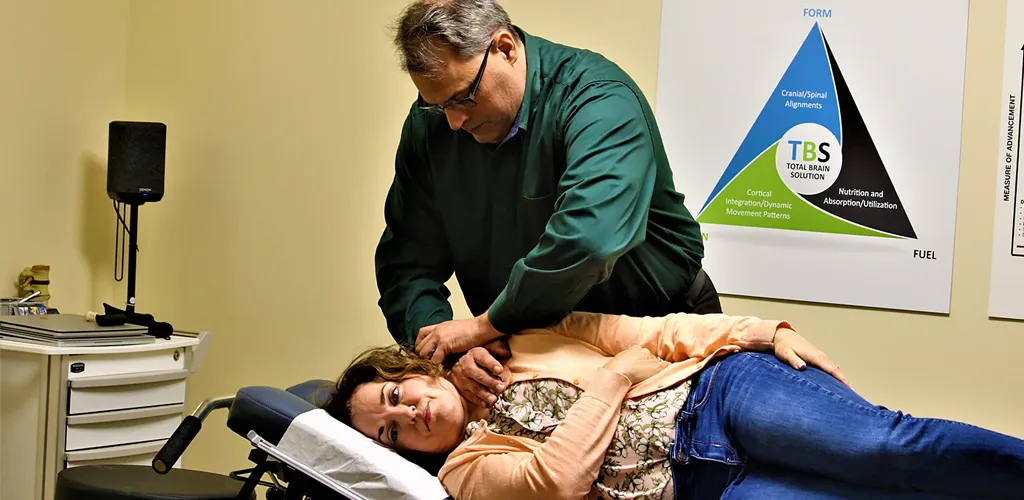 Dr. Andy Marrone treating a patient in the Snohomish clinic